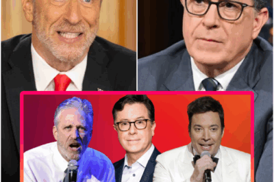 🔥 LATE-NIGHT REBELLION ERUPTS! In a moment no one saw coming, Jon Stewart, Stephen Colbert, and Jimmy Fallon shocked Hollywood by locking arms with suspended ABC host Jimmy Kimmel — detonating the late-night stage with a show of unity never seen before.
